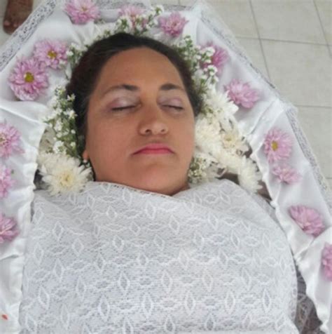 woman who laid in coffin at fake funeral while friends paid respects