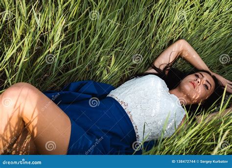 beautiful girl lying   grass stock photo image  beautiful