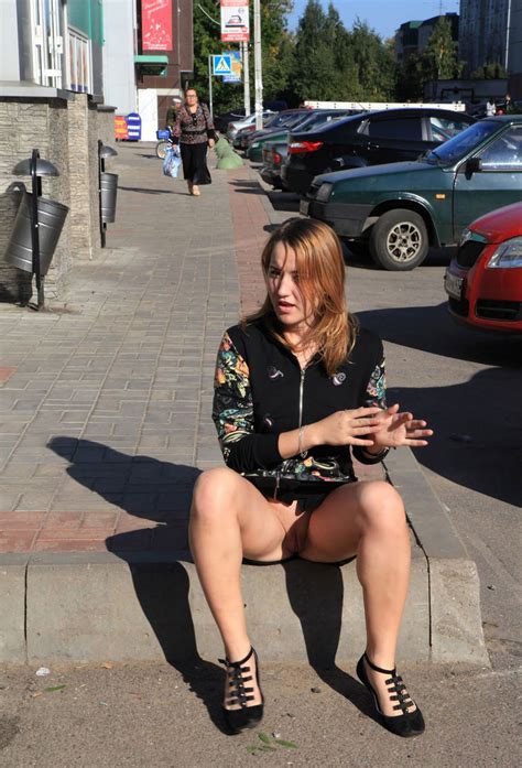 lovely girl with no panties sitting on the pavement russian sexy girls