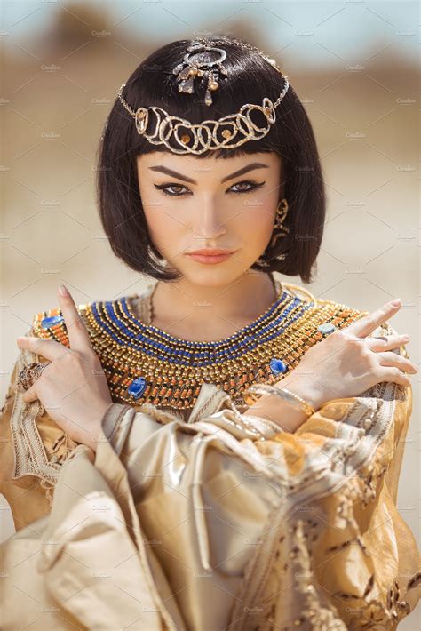 beautiful woman with fashion makeup and hairstyle like egyptian queen