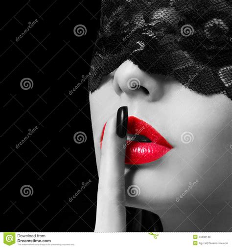 hush woman with finger on her red lips showing shush erotic girl with