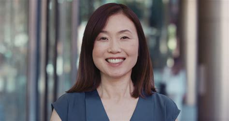 Portrait Of Japanese Businesswoman Smiling Stock Footage