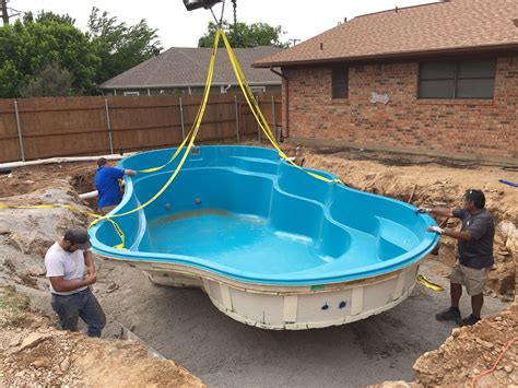 installing  fiberglass pool  backyard haven
