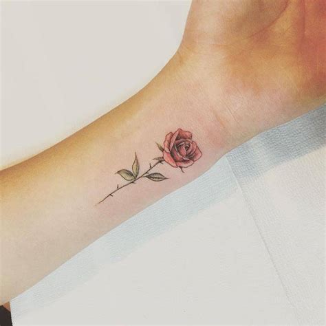 red rose tattoo    wrist