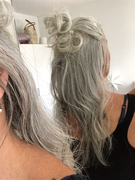 back of hair half up messy bun long gray hair silver