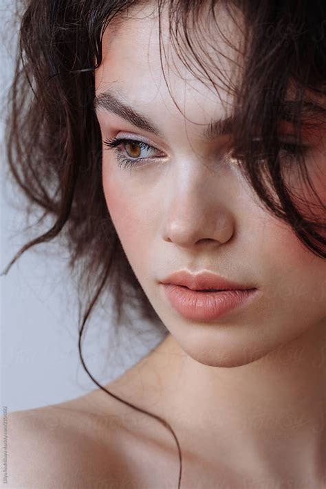 Beauty Portrait Of Young Brunette Looking Away By Stocksy Contributor