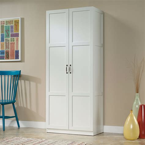 white wardrobe storage cabinet   shelves  panel doors