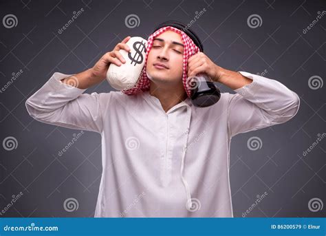 The Arab With Oil On Gray Background Stock Image Image Of Executive