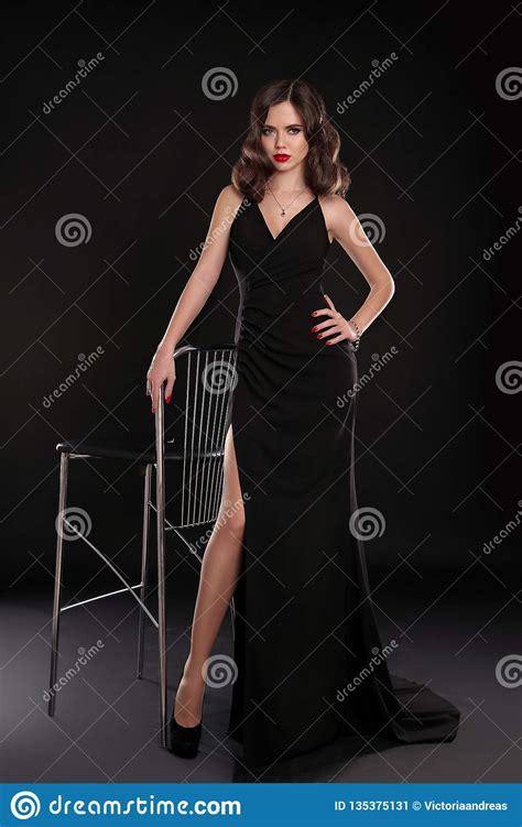 Elegant Lady In Long Dress With Retro Wavy Hairstyle