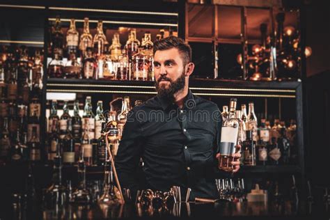 bar manager  making drinks   bar stock image image  bourbon occupation