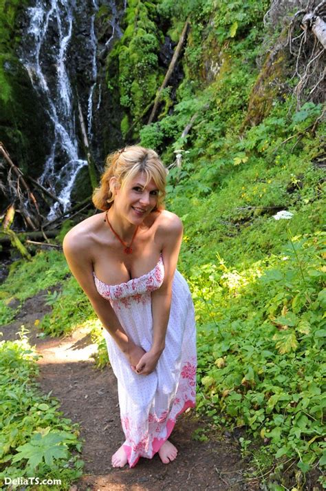 pretty delia by waterfall erect under her dress pichunter