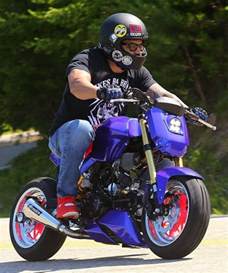 heavily customized  honda grom bike urious