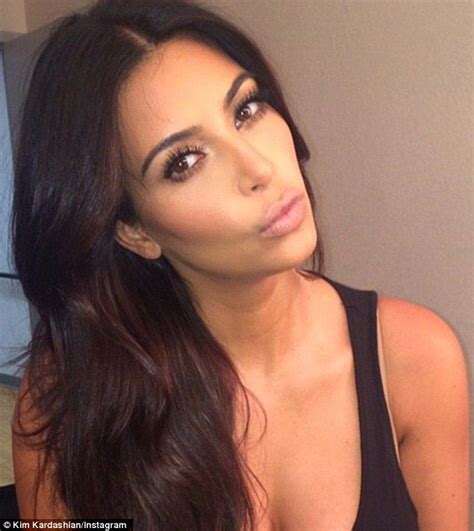 Pregnant Kim Kardashian Perfects Her Pout For Make Up