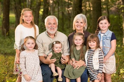 extended family portrait  wooded setting   generations