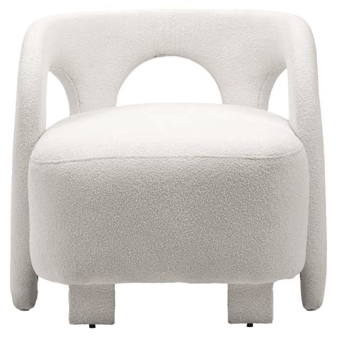 white curvy upholstered sofa inspired by egypt s nubian architecture