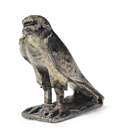an egyptian gilt silver falcon