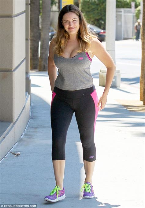 Kelly Brook Displays Curves As She Heads To Gym With Fiancé David