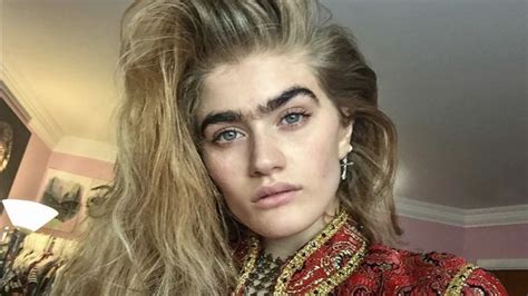 watch this model is making the unibrow movement happen