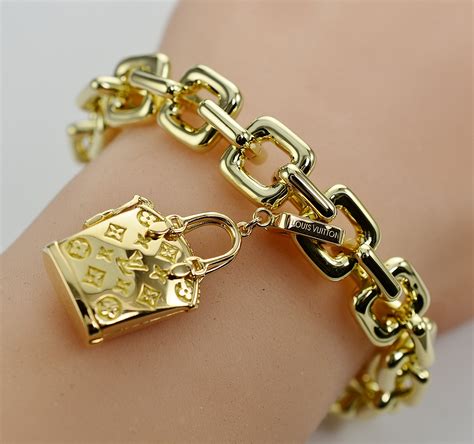 louis vuitton solid  gold charm bracelet  purse charm