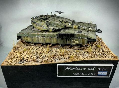 A Model Of A Tank On Display In A Museum Case With A Plaque That Reads