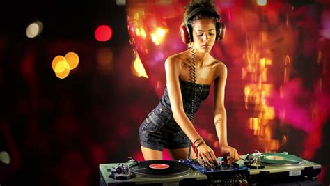 a sexy female dj dancing and playing records with disco