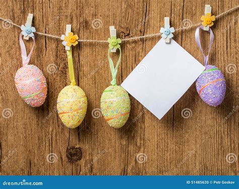colorful easter eggs hanging  ribbons stock photo image  objects