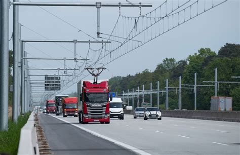 germanys  electric highway charges trucks   drive bloomberg