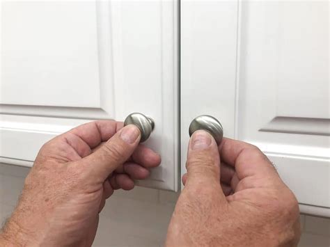 install knobs  cabinet doors