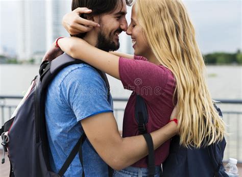 couple having a sweet time together in an amusement park stock image