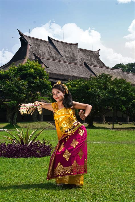 A Balinese Girl In Her Traditional Clothing Photographed By Muhammad