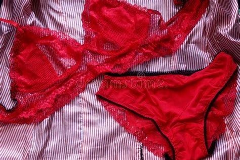 Red Women`s Lace Underwear A Set Of Bra And Panties On A S Stock Image
