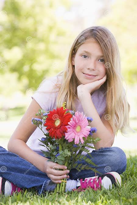Young Girl Holding Flowers Stock Image Image Of Girl 5944373