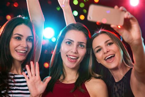 Smiling Girls Taking Selfie In A Night Club Stock Image Image Of