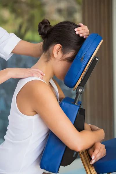 Brunette Getting A Massage In Chair Stock Image Everypixel