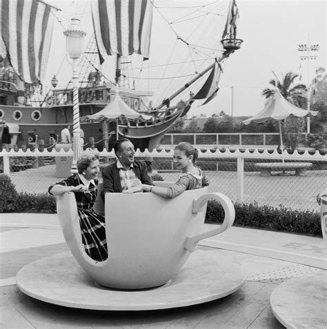 walt disney his wife lillian and their daughter diane take a vintage disneyland pictures