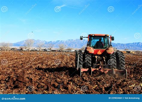 tractor plowing field stock photo image