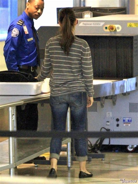 celebrity butts mila kunis at the airport