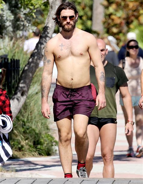 hottest celebrity men at the beach in swim trunks shirtless