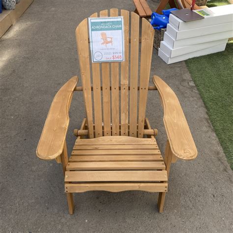 wooden adirondack chair  grows