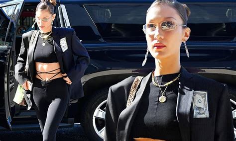 bella hadid shows off her underboob and toned abs as she steps out in