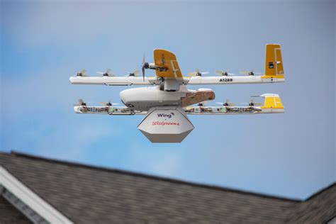 alphabets wing begins making  commercial drone deliveries    techcrunch