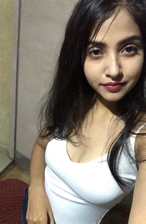 Indian Girl Showing Cleavage While Taking Photo Indianxphoto