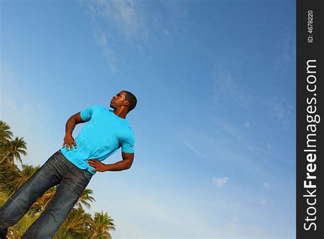young black man standing tall  stock images