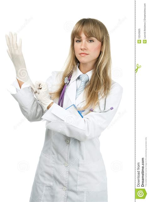 female doctor putting on surgical glove stock image image of exam success 12243925