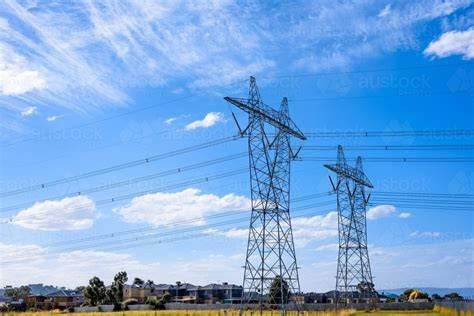 image  high voltage power transmission tower  blue sky background electricity distribution