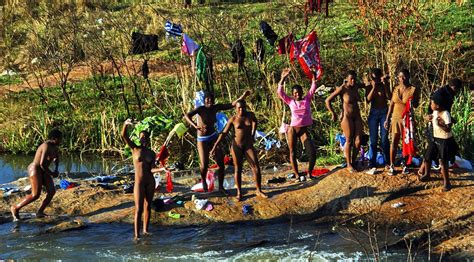 black zulu girls bathing in the river
