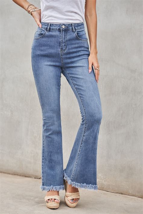 medium washed high waist flare jeans with raw edges