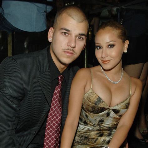 why did rob kardashian and adrienne bailon break up we ve got the details