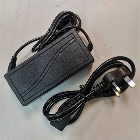 acdc power adapter input  vhz  output    uk