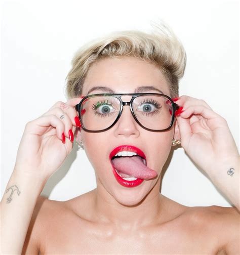 miley cyrus tattoos pictures images pics photos of her tattoos